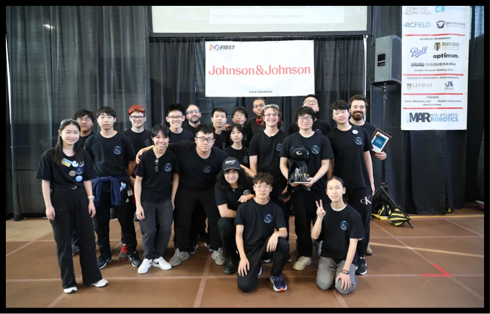 Masterman Robotics students and mentors together at competition with their award